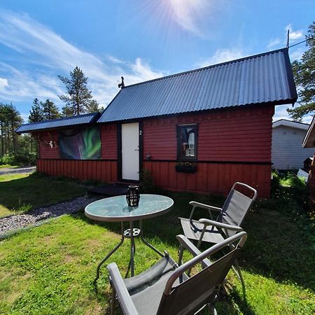 Camp Caroli Wooden Cabins Юккасъярви Экстерьер фото
