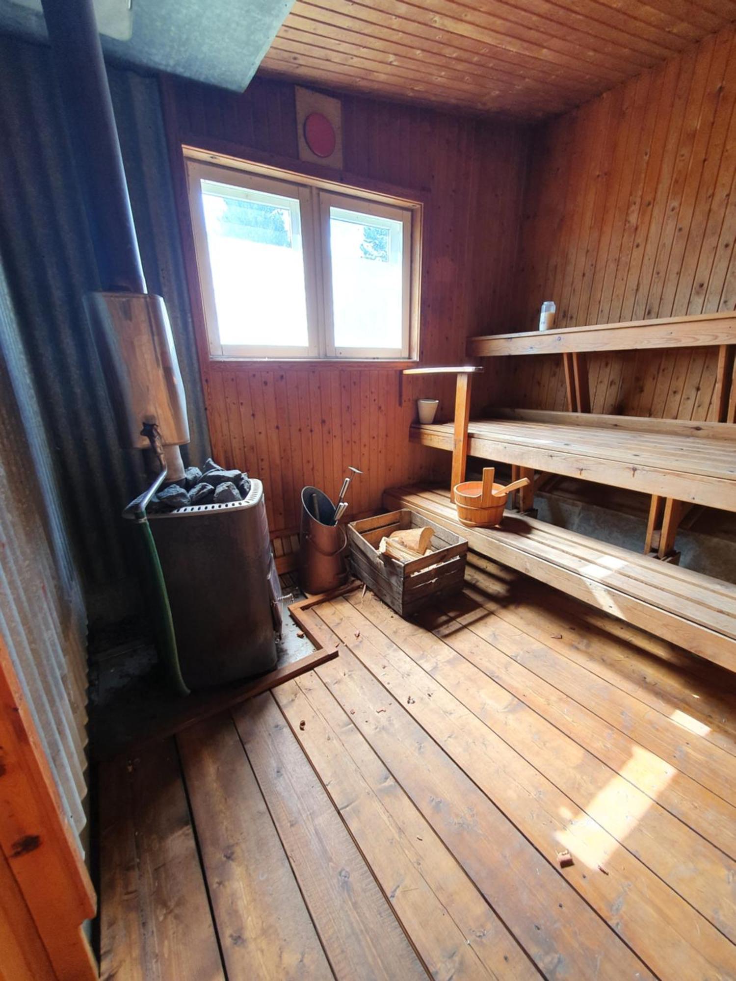 Camp Caroli Wooden Cabins Юккасъярви Экстерьер фото