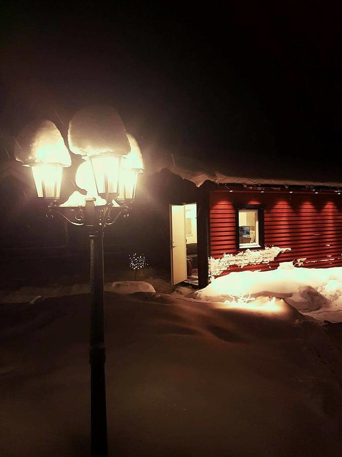 Camp Caroli Wooden Cabins Юккасъярви Экстерьер фото