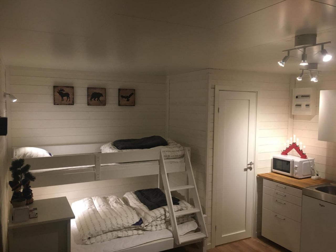Camp Caroli Wooden Cabins Юккасъярви Экстерьер фото